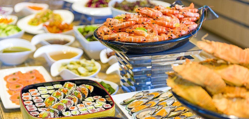 Prawns, sushi and fresh seafood laid out on the buffet at Vue Restaurant