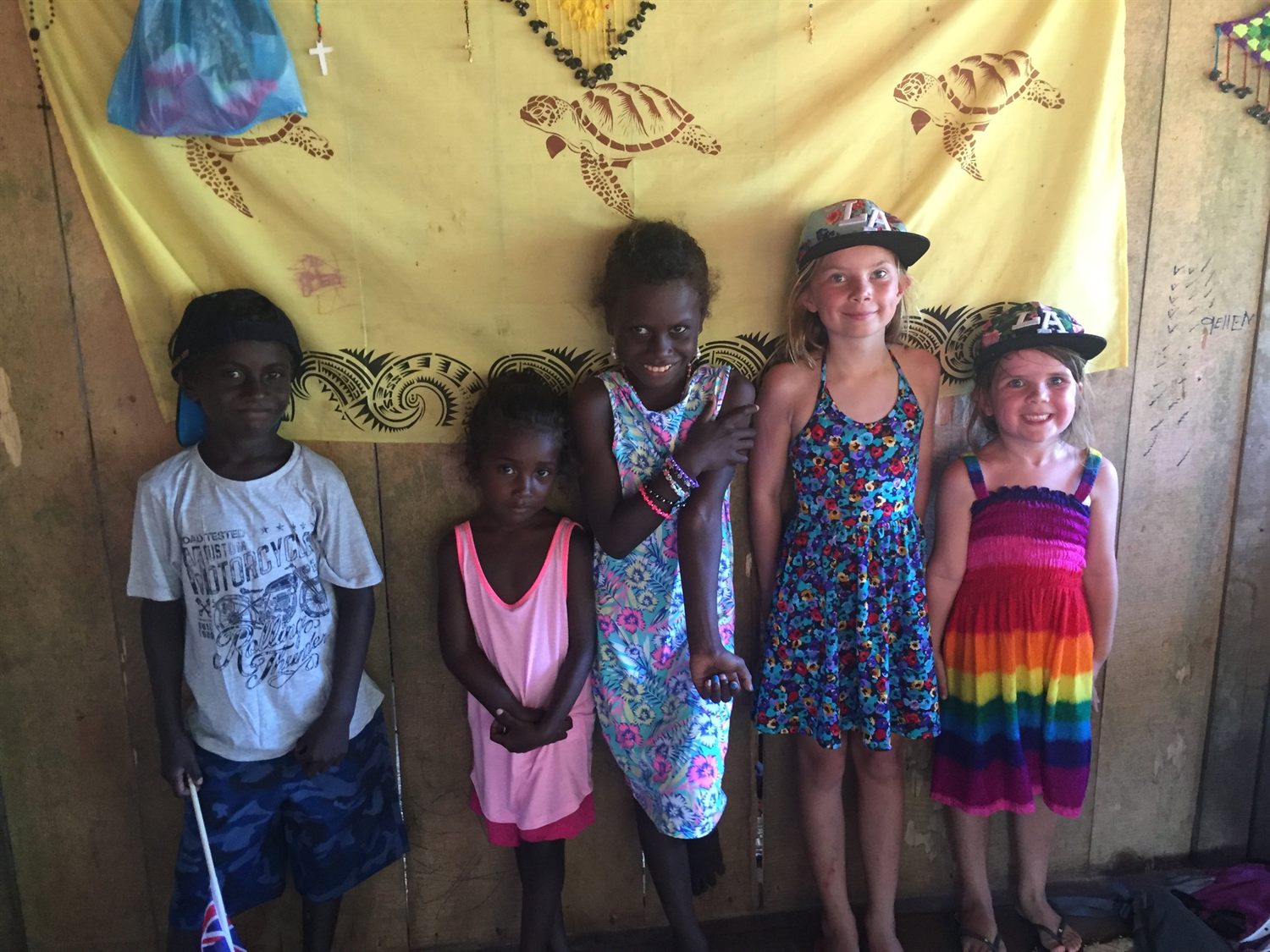 Charlotte and Lola playing with local kids, Papatura