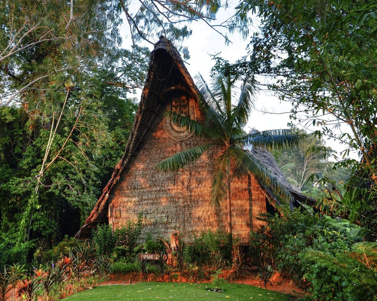 Karawari Lodge’s steep-roofed main building, built in the form of a traditional spirit house