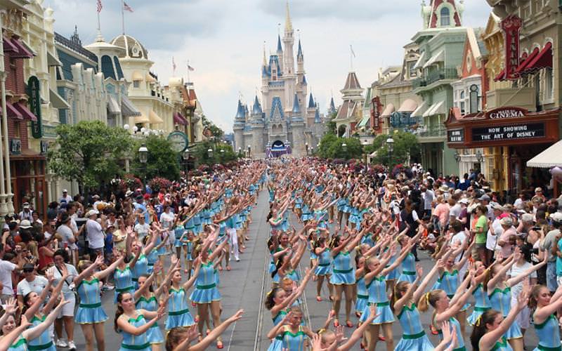 Dancers performing down Main Street USA at Walt Disney World